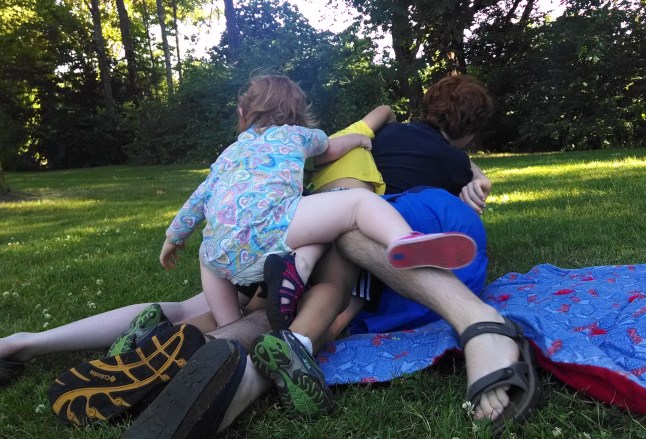 A 16 year old buried under a puppy pile of 7 year old, 3 year old, and 2 year old buddies...