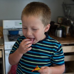 photo of a child disgusted with food