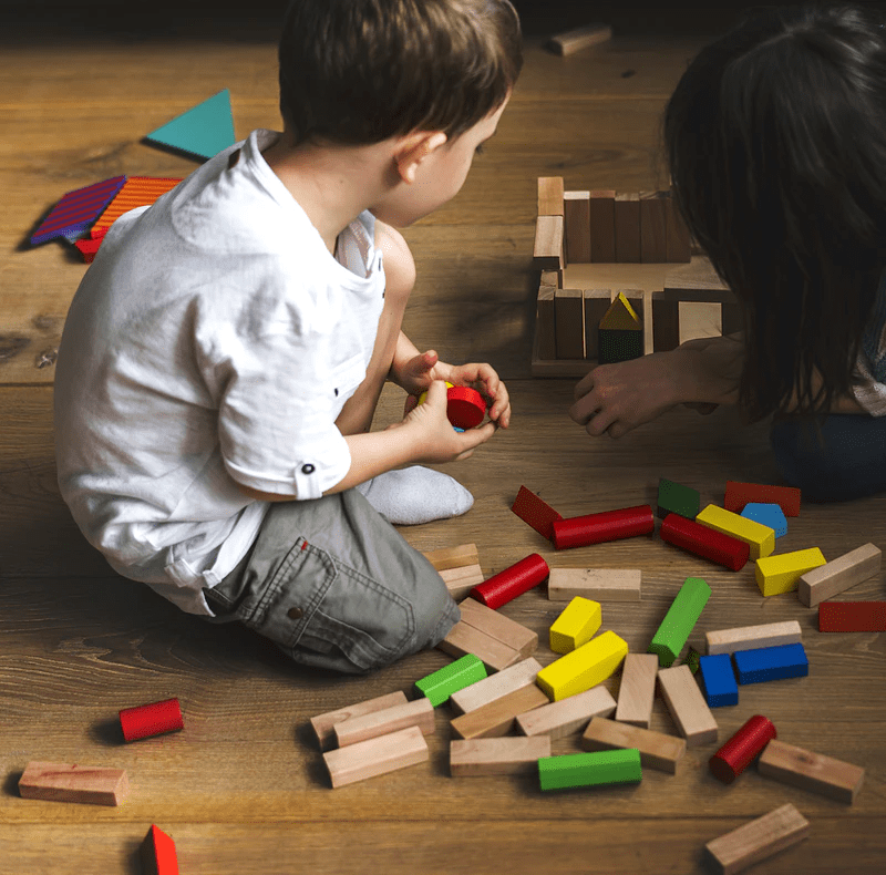 child working with blocks